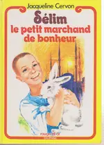 Couverture du roman Sélim, le petit marchand de bonheur représentant un garçon avec un lapin blanc, en dessin.