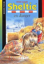 Couverture du livre pour enfants Sheltie en danger représentant le dessin d'une enfant et d'un poney couchés sous une couverture dans la paille.